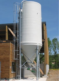 Quicklime unloader with screw feeder