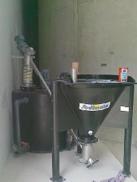 Microsand slurry system with sack-tip hopper feeding to a slurry tank