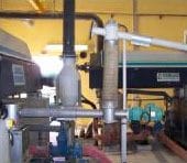Lime injector screw into sludge pump